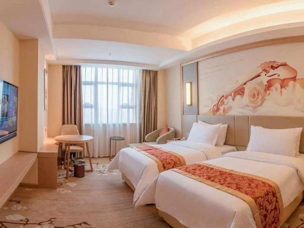 Bed in Venus International Hotel Guangdong Meizhou Fengshun Huamao Hot-Spring