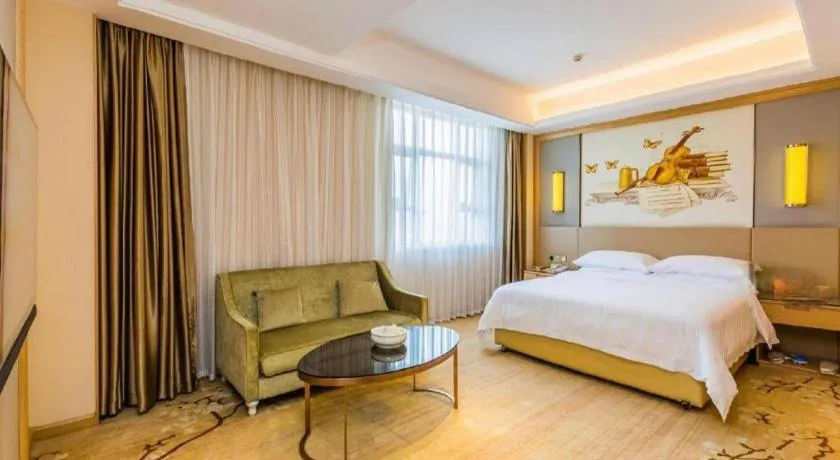 Bed in Venus International Hotel Guangdong Meizhou Fengshun Huamao Hot-Spring