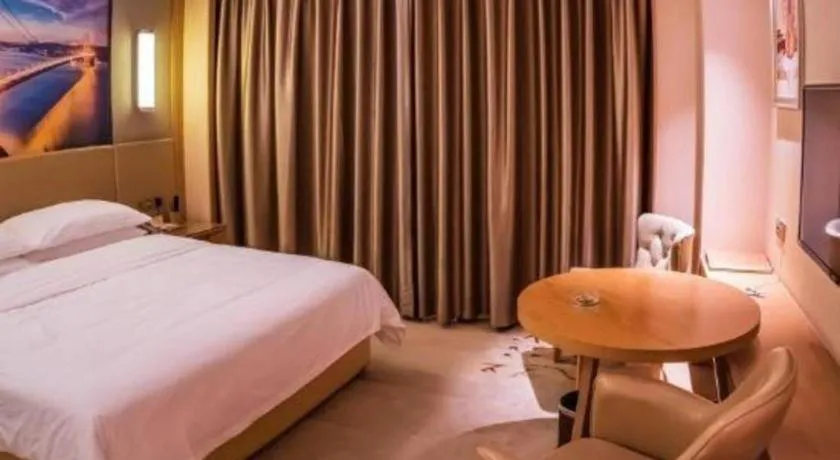 Bed in Venus International Hotel Guangdong Meizhou Fengshun Huamao Hot-Spring