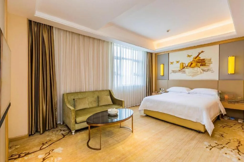Bed in Venus International Hotel Guangdong Meizhou Fengshun Huamao Hot-Spring