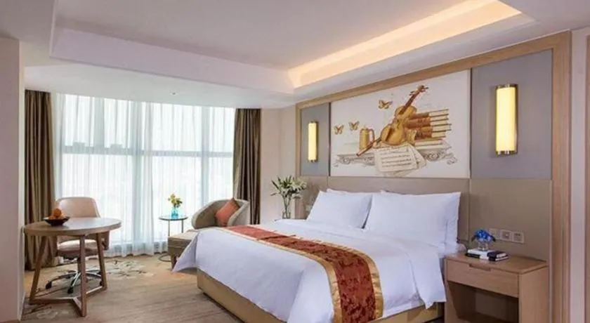 Bed in Venus International Hotel Guangdong Meizhou Fengshun Huamao Hot-Spring