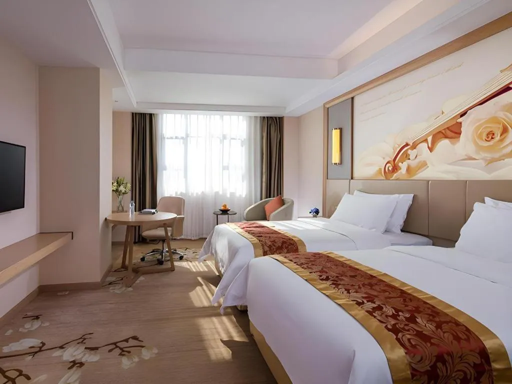 Bed in Venus International Hotel Guangdong Meizhou Fengshun Huamao Hot-Spring