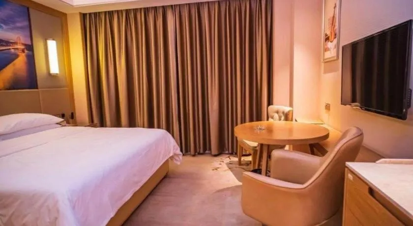 Bed in Venus International Hotel Guangdong Meizhou Fengshun Huamao Hot-Spring