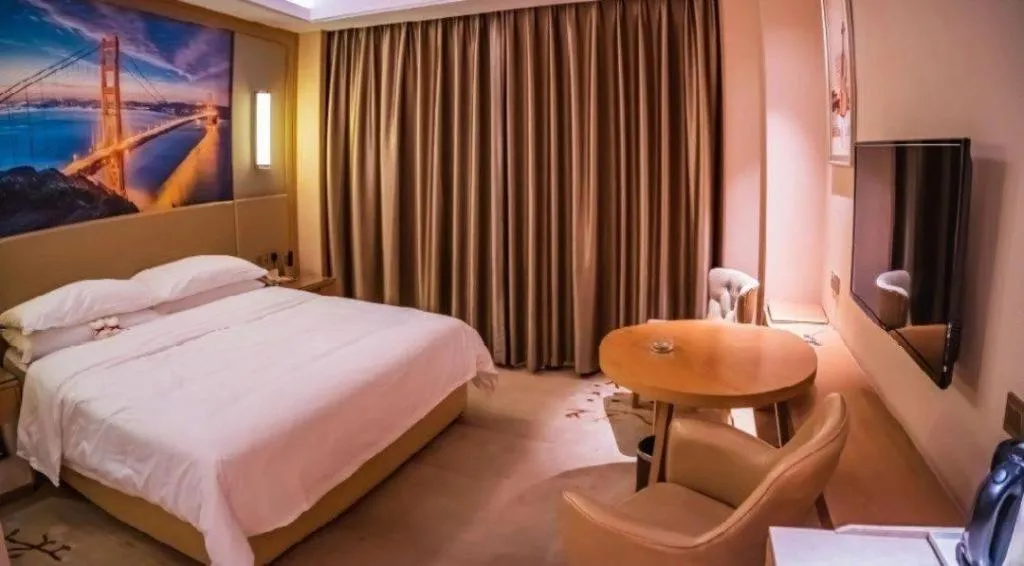 Bed in Venus International Hotel Guangdong Meizhou Fengshun Huamao Hot-Spring