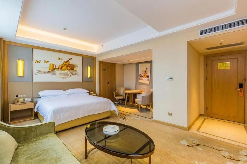 Bed in Venus International Hotel Guangdong Meizhou Fengshun Huamao Hot-Spring