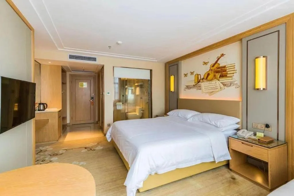 Bed in Venus International Hotel Guangdong Meizhou Fengshun Huamao Hot-Spring