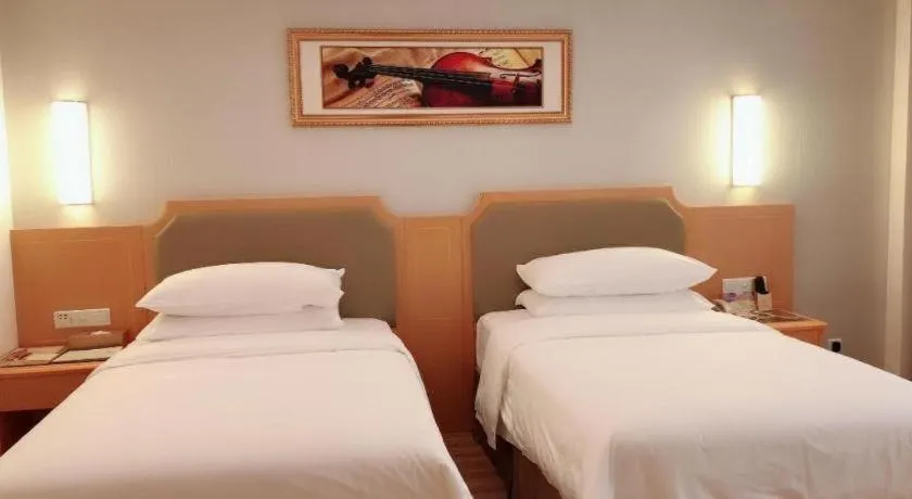 Bed in Vienna Hotel Guangdong Foshan Wenhua North Road