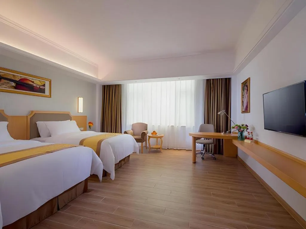 Bed in Vienna Hotel Guangdong Foshan Wenhua North Road