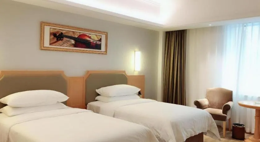 Bed in Vienna Hotel Guangdong Foshan Wenhua North Road