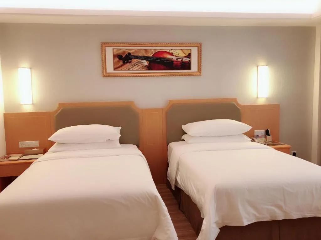 Bed in Vienna Hotel Guangdong Foshan Wenhua North Road