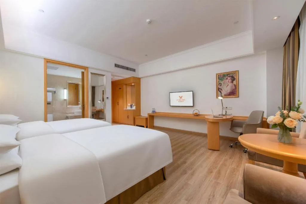Bed in Vienna Hotel Guangdong Foshan Wenhua North Road