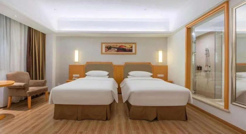 Bed in Vienna Hotel Guangdong Foshan Wenhua North Road