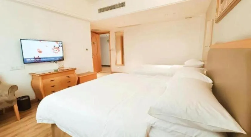 Bed in Vienna Hotel Guangdong Foshan Wenhua North Road