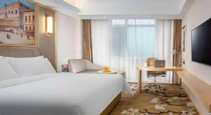 Bed in Vienna Hotel Shandong Qingdao Jiaodong International Airport Hai'er Avenue