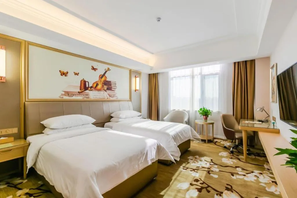 Bed in Vienna Hotel Shandong Qingdao Jiaodong International Airport Hai'er Avenue