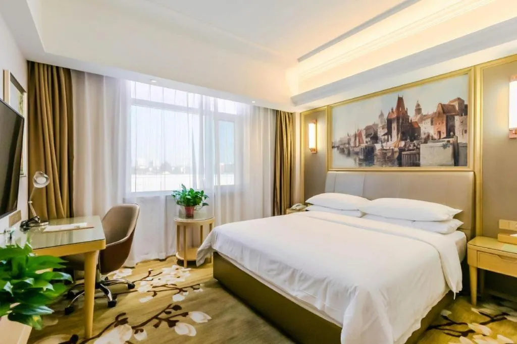 Bed in Vienna Hotel Shandong Qingdao Jiaodong International Airport Hai'er Avenue