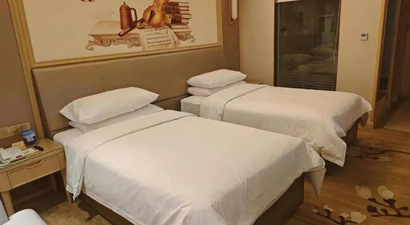 Bed in Vienna Hotel Shandong Qingdao Jiaodong International Airport Hai'er Avenue