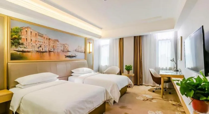 Bed in Vienna Hotel Shandong Qingdao Jiaodong International Airport Hai'er Avenue