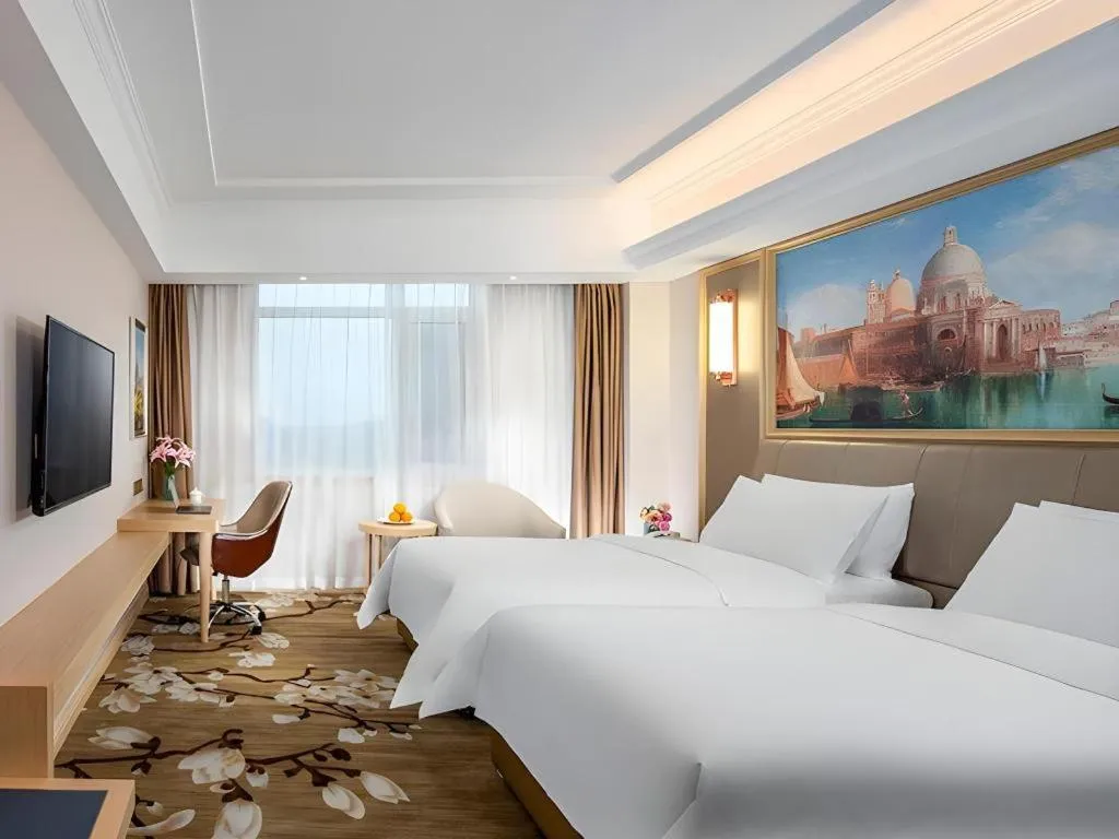 Bed in Vienna Hotel Shandong Qingdao Jiaodong International Airport Hai'er Avenue