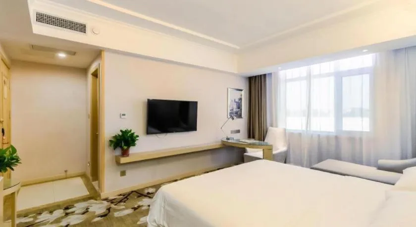 Bed in Vienna Hotel Shandong Qingdao Jiaodong International Airport Hai'er Avenue