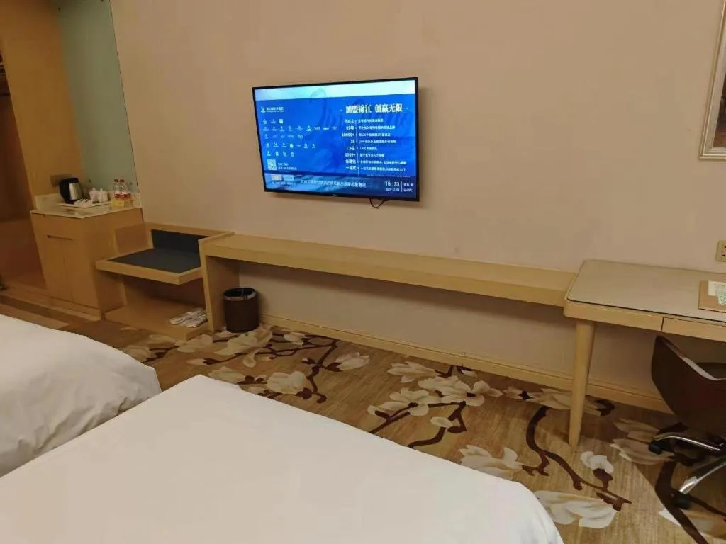 Bed in Vienna Hotel Shandong Qingdao Jiaodong International Airport Hai'er Avenue