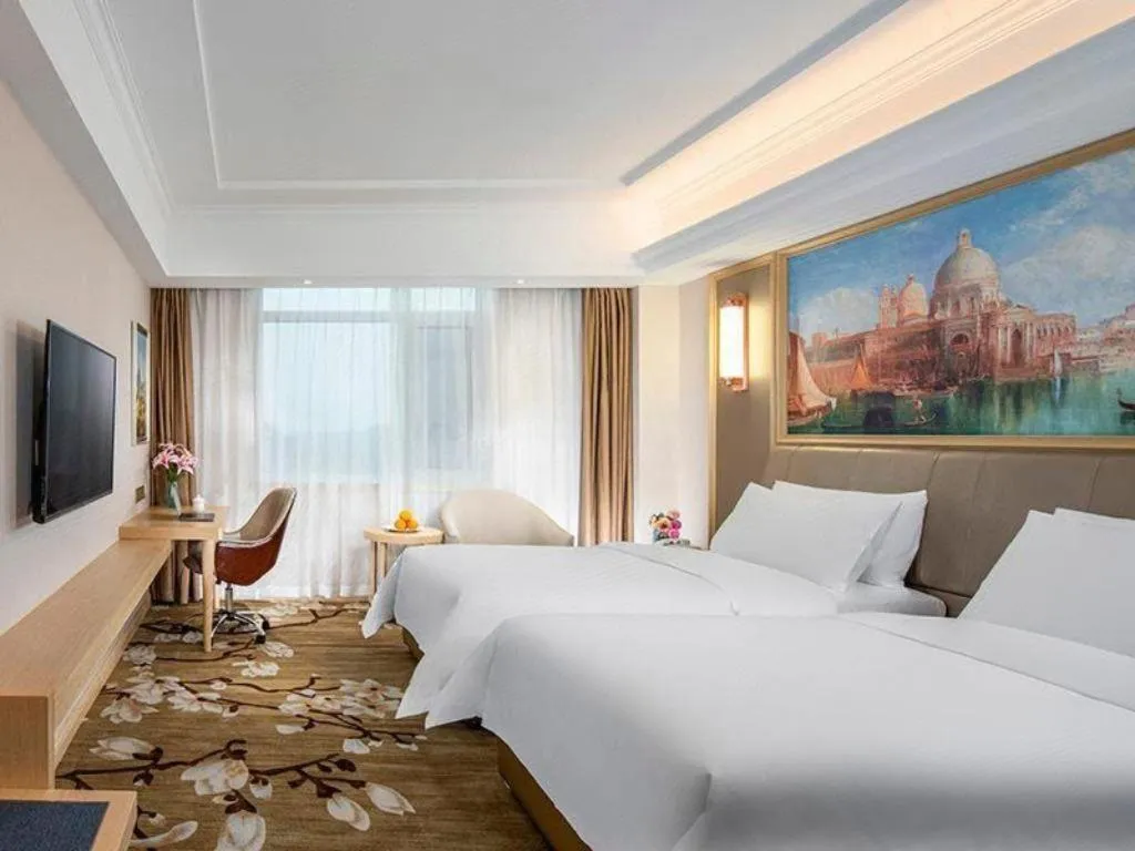 Bed in Vienna Hotel Shandong Qingdao Jiaodong International Airport Hai'er Avenue