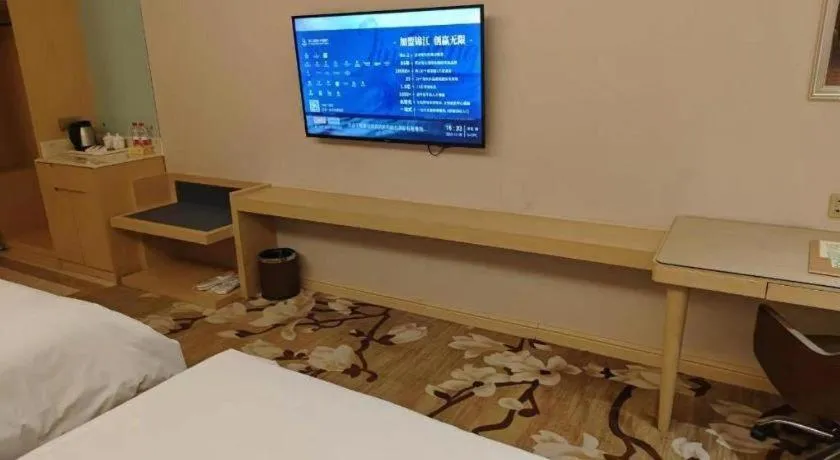 Bed in Vienna Hotel Shandong Qingdao Jiaodong International Airport Hai'er Avenue