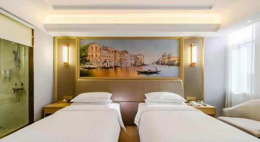 Bed in Vienna Hotel Shandong Qingdao Jiaodong International Airport Hai'er Avenue