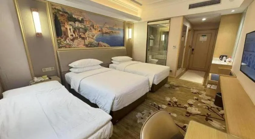Bed in Vienna Hotel Shandong Qingdao Jiaodong International Airport Hai'er Avenue