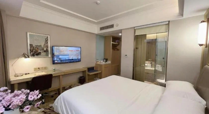 Bed in Vienna Hotel Shandong Qingdao Jiaodong International Airport Hai'er Avenue