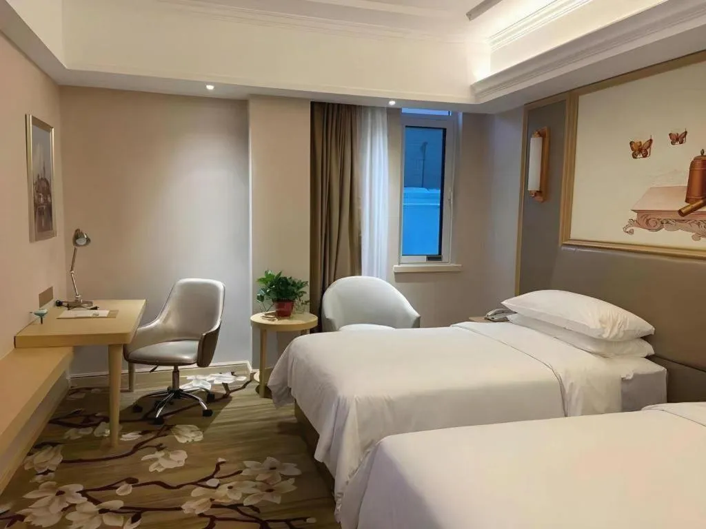 Bed in Vienna Hotel Shandong Qingdao Jiaodong International Airport Hai'er Avenue