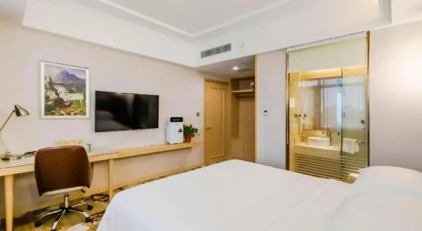 Bed in Vienna Hotel Shandong Qingdao Jiaodong International Airport Hai'er Avenue