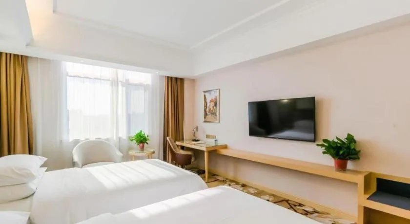 Bed in Vienna Hotel Shandong Qingdao Jiaodong International Airport Hai'er Avenue