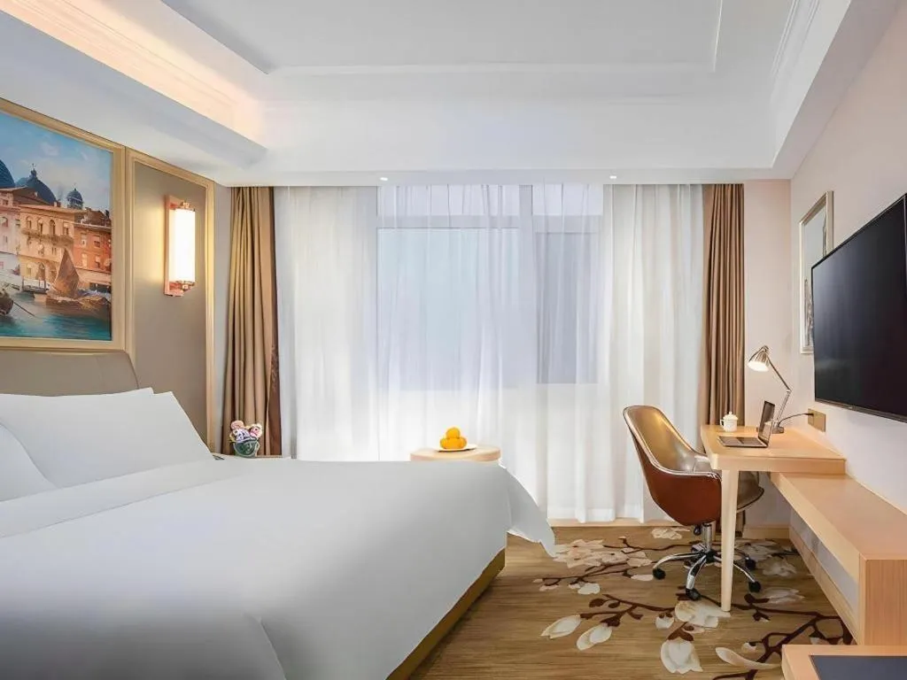 Bed in Vienna Hotel Shandong Qingdao Jiaodong International Airport Hai'er Avenue