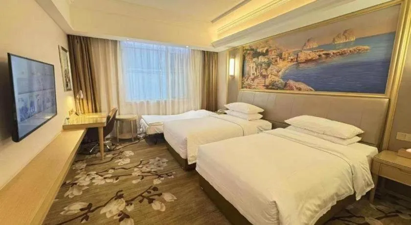 Bed in Vienna Hotel Shandong Qingdao Jiaodong International Airport Hai'er Avenue