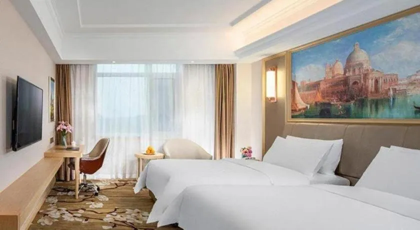 Bed in Vienna Hotel Shandong Qingdao Jiaodong International Airport Hai'er Avenue