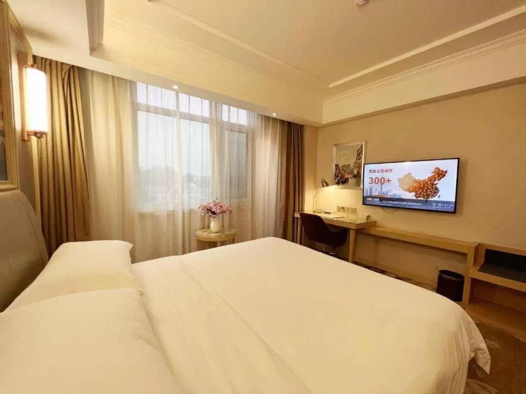 Bed in Vienna Hotel Shandong Qingdao Jiaodong International Airport Hai'er Avenue