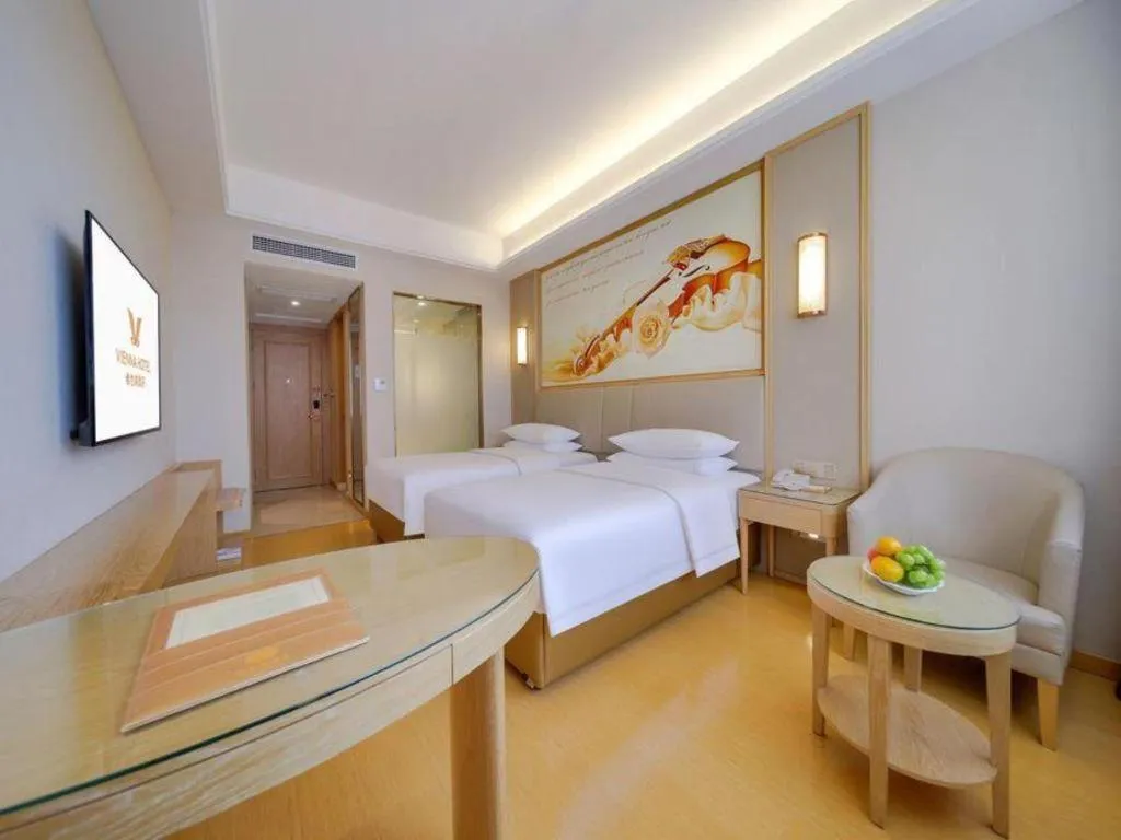 Bed in Vienna Hotel Zhengzhou Fengchan Road Fortune Plaza
