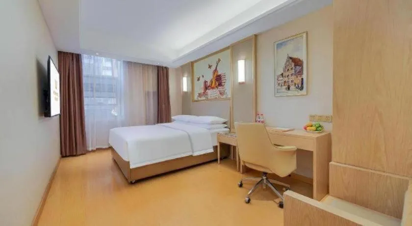 Bed in Vienna Hotel Zhengzhou Fengchan Road Fortune Plaza