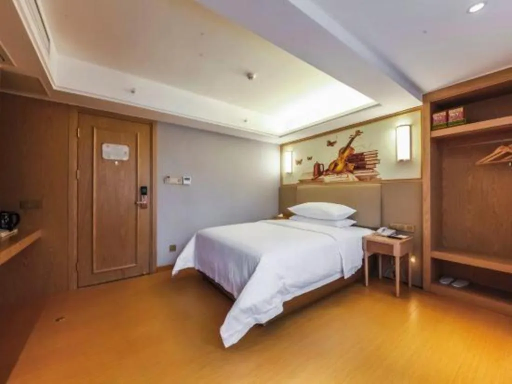 Bed in Vienna Hotel Zhengzhou Fengchan Road Fortune Plaza