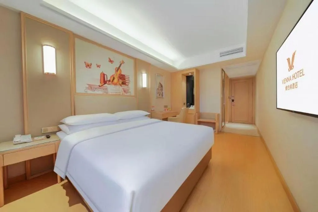 Bed in Vienna Hotel Zhengzhou Fengchan Road Fortune Plaza