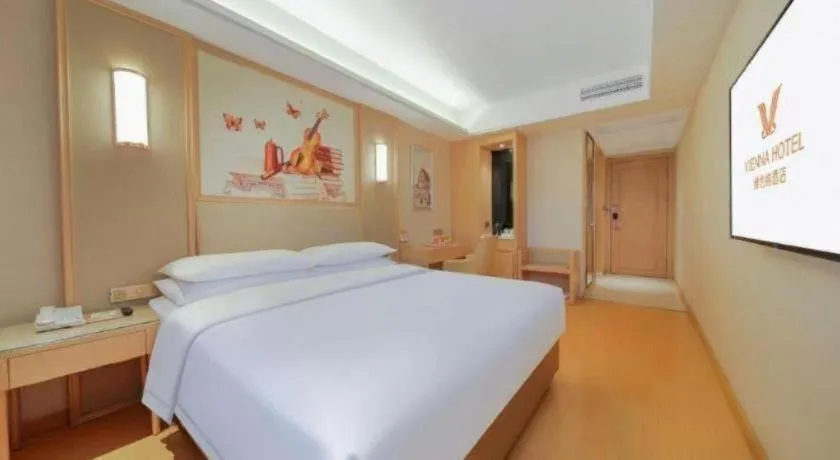 Bed in Vienna Hotel Zhengzhou Fengchan Road Fortune Plaza