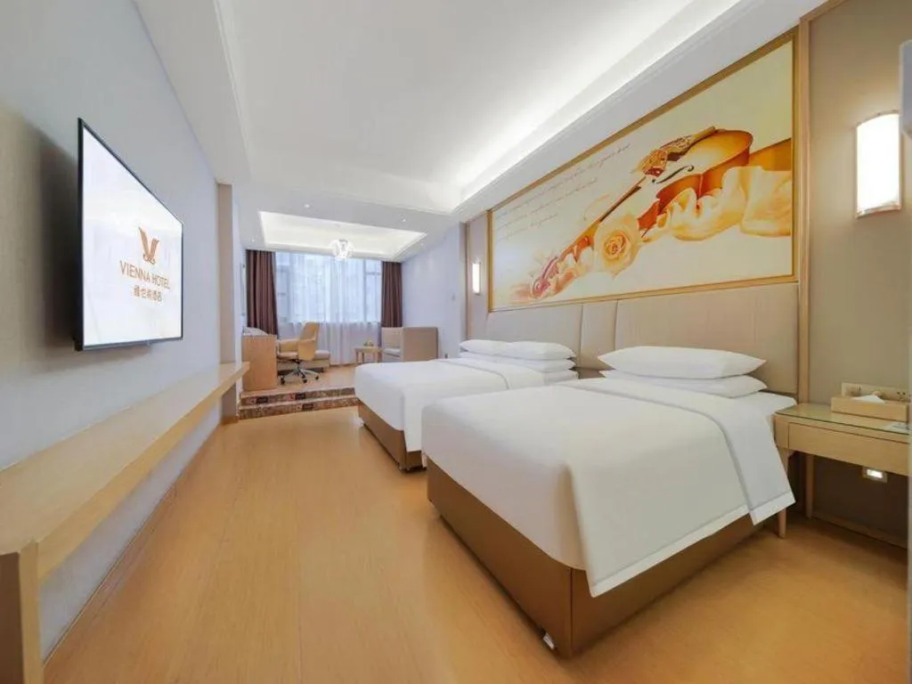 Bed in Vienna Hotel Zhengzhou Fengchan Road Fortune Plaza