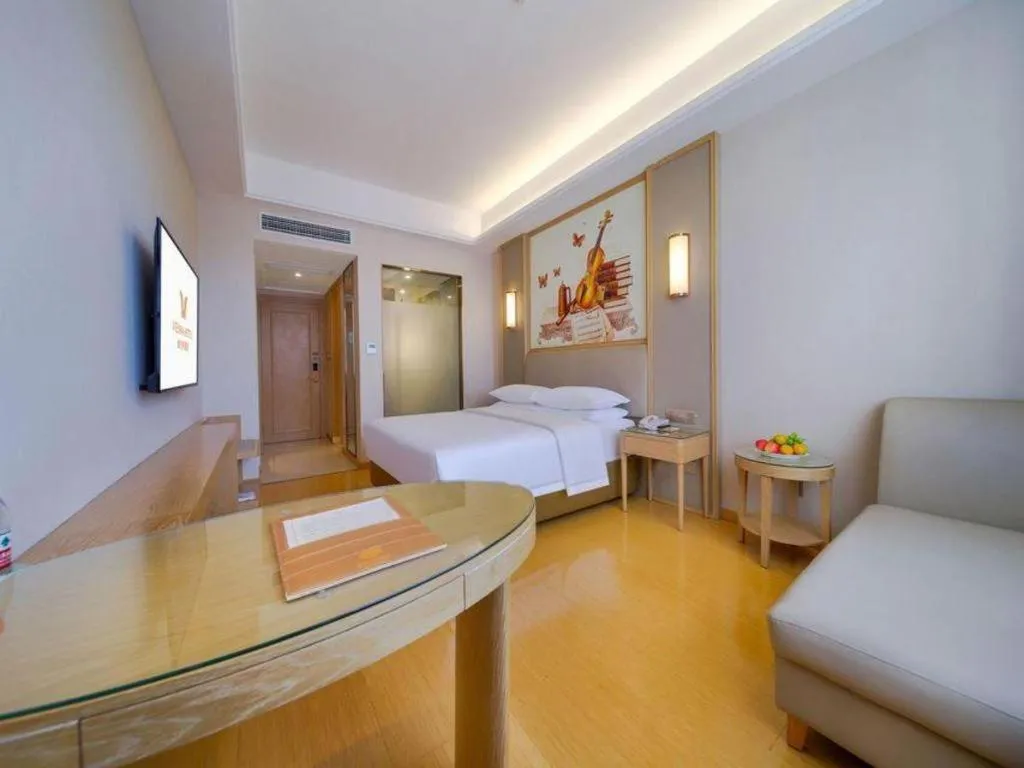 Bed in Vienna Hotel Zhengzhou Fengchan Road Fortune Plaza