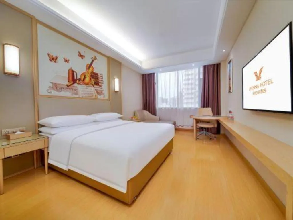 Bed in Vienna Hotel Zhengzhou Fengchan Road Fortune Plaza