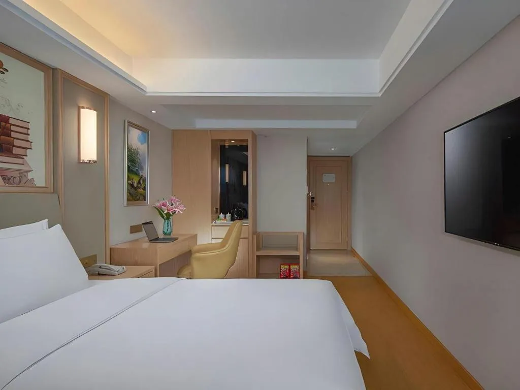 Bed in Vienna Hotel Zhengzhou Fengchan Road Fortune Plaza