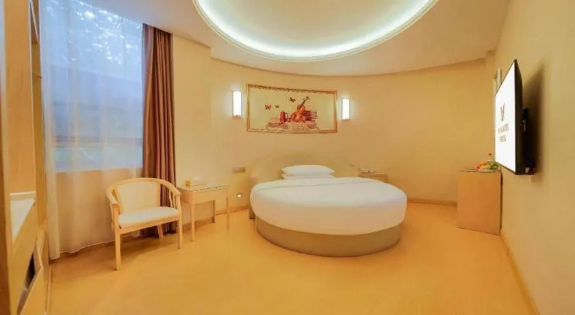 Bed in Vienna Hotel Zhengzhou Fengchan Road Fortune Plaza