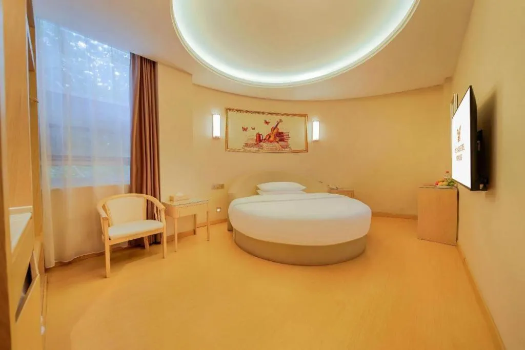 Bed in Vienna Hotel Zhengzhou Fengchan Road Fortune Plaza
