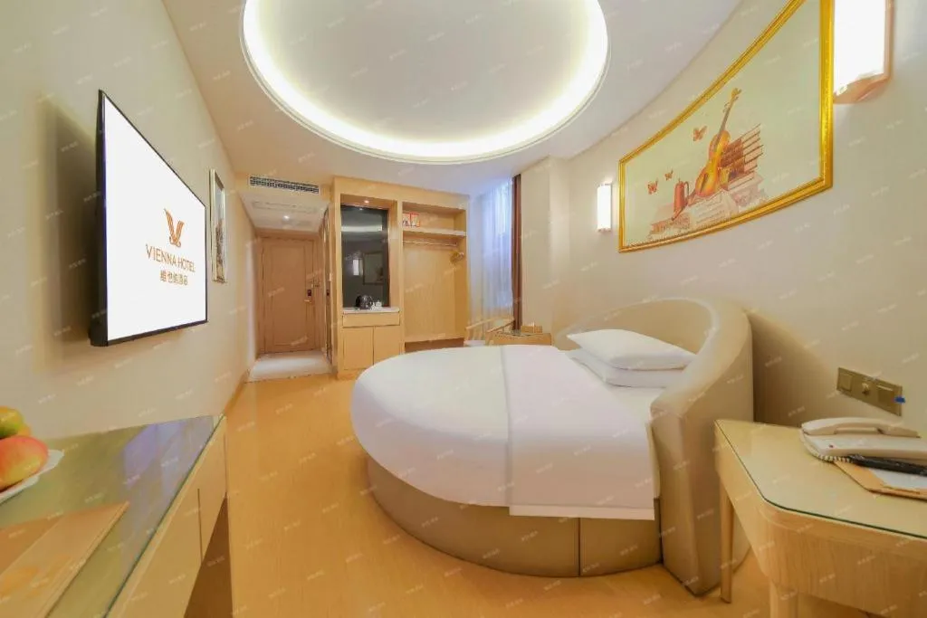 Bed in Vienna Hotel Zhengzhou Fengchan Road Fortune Plaza