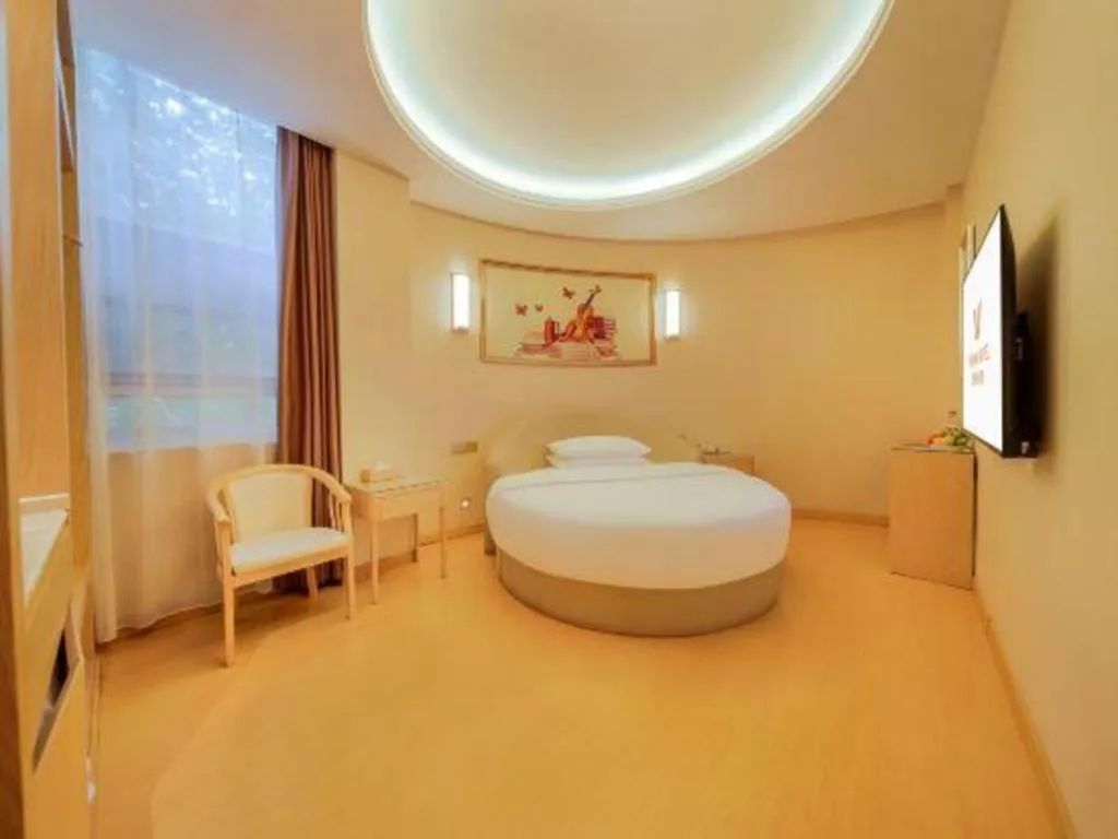 Bed in Vienna Hotel Zhengzhou Fengchan Road Fortune Plaza